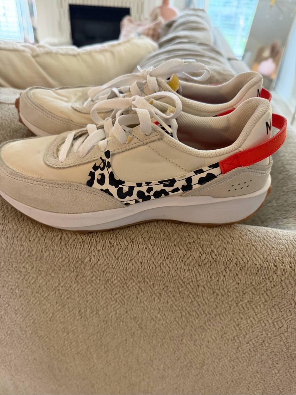 Nike Women’s Cream/White Sneakers with Leopard Swoosh and Red Heel Accent